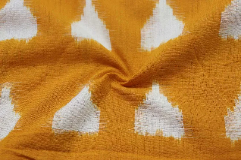 Mustard & White Motifs Cotton Ikat Fabric